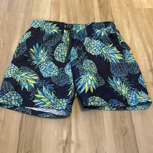 Men’s swim trunks, size 32-34, blue with pineapples